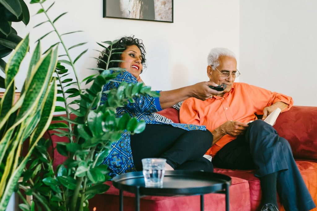 a man and a woman sitting on a couch